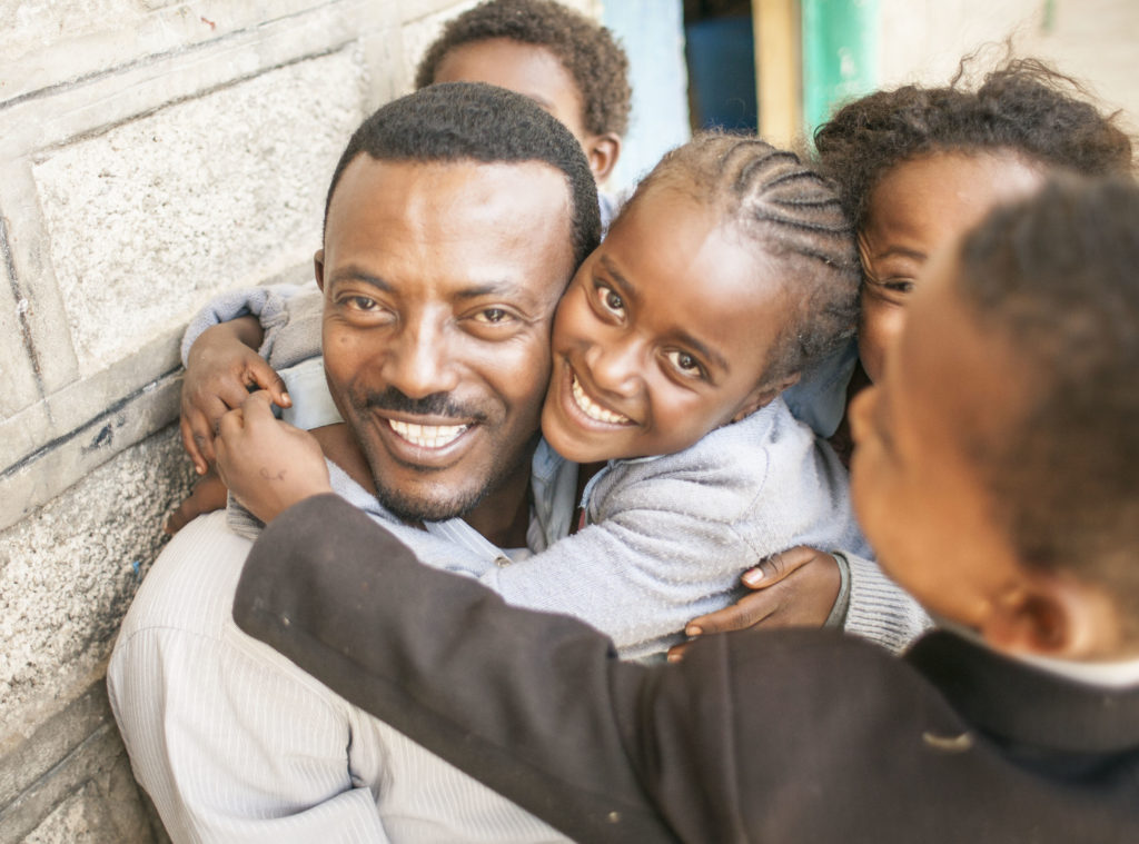 Portrait of Tesfa with children