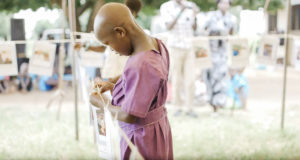 Young girl in Uganda choosing her HopeChest Friend