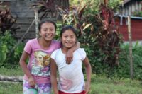 Two girls at La Cuchilla CarePoint pose together