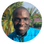 Circular photo of Philip smiling