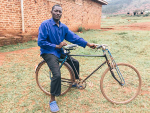 A man in Uganda on a bicycle