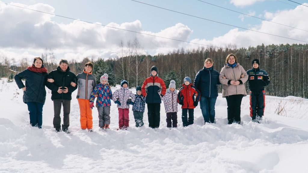 Line of people in Russia standing in the snow
