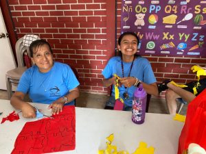 Photo Jun 24 2025 Ceiba Blanca cutting fabric
