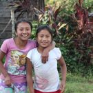 Two girls at La Cuchilla CarePoint pose together